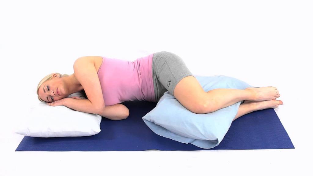 How to sleep on your side with back pain - YouTube