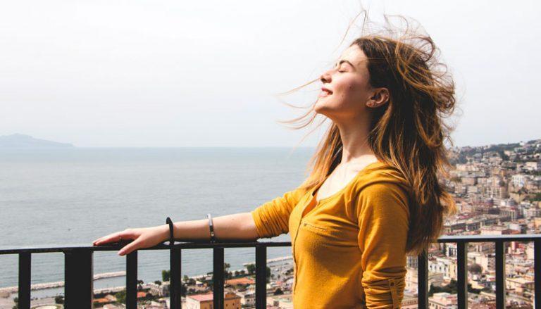 woman enjoys the wind