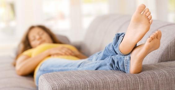 Woman Sleeping on Couch