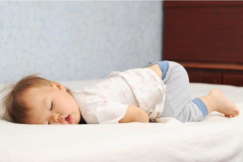 cute baby sleeping on stomach with butt in the air